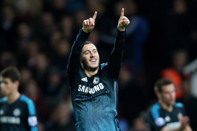 LONDON, ENGLAND - MARCH 04:  Eden Hazard of Chelsea celebrates after scoring the opening goal during the Barclays Premier League match between West Ham and Chelsea at the Boleyn Ground on March 4, 2015 in London, England.  (Photo by Paul Gilham/Getty Images)