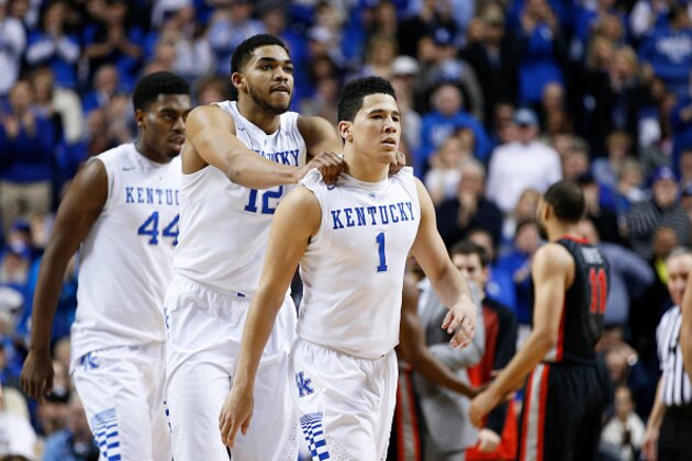 LEXINGTON, KY - FEBRUARY 3: Devin Booker #1 and Karl-Anthony Towns #12 of the Kentucky Wildcats celebrate against the Georgia Bulldogs during the game at Rupp Arena on February 3, 2015 in Lexington, Kentucky. Kentucky defeated Georgia 69-58. (Photo by Joe Robbins/Getty Images)