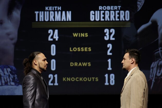 Boxers Keith Thurman, left, and Robert Guerrero pose for pictures during a news conference in New York, Wednesday, Jan. 14, 2015. The match between these two boxers will be broadcast in prime time on March 7, 2015, as part of the Premiere Boxing Champions series on NBC. (AP Photo/Seth Wenig)