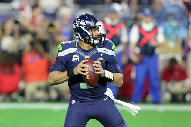 Seattle Seahawks QB Russell Wilson #3 in action during NFL Super Bowl XLIX football game against the New England Patriots on Sunday, Feb. 1, 2015, in Glendale, Ariz.  (AP Photo/Gregory Payan)