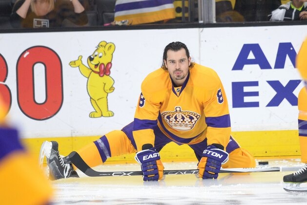 LOS ANGELES, CA - FEBRUARY 12: Drew Doughty #8 of the Los Angeles Kings stretches before a game against the Calgary Flames at STAPLES Center on February 12, 2015 in Los Angeles, California. (Photo by Aaron Poole/NHLI via Getty Images)
