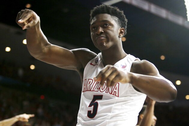 Arizona forward Stanley Johnson reacts after scoring during the second half of an NCAA college basketball game against UCLA, Saturday, Feb. 21, 2015, in Tucson, Ariz. (AP Photo/Rick Scuteri)