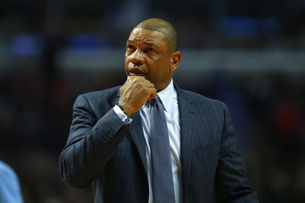 Los Angeles Clippers head coach Doc Rivers looks at the scoreboard during the first half of an NBA basketball game against the Chicago Bulls in Chicago, on Sunday, March 1, 2015. (AP Photo/Jeff Haynes)