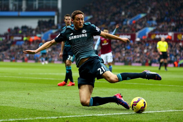BIRMINGHAM, ENGLAND - FEBRUARY 07:  Nemanja Matic of Chelsea attempts to stop the ball from going out of play during the Barclays Premier League match between Aston Villa and Chelsea at Villa Park on February 7, 2015 in Birmingham, England.  (Photo by Clive Mason/Getty Images)