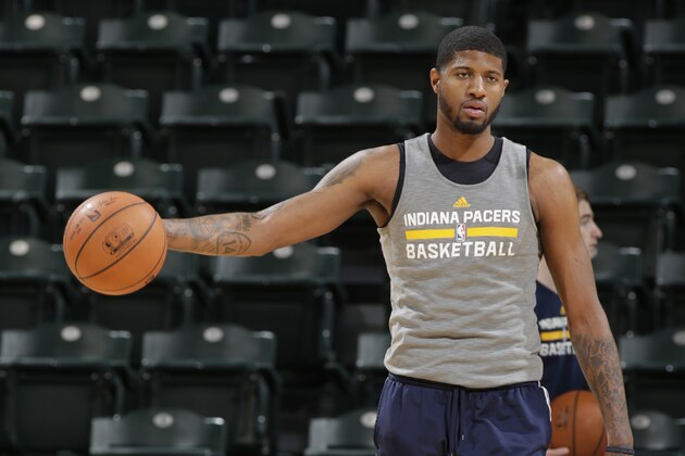INDIANAPOLIS - FEBRUARY 27:  Paul George #13 of the Indiana Pacers warms up before the game against the Cleveland Cavaliers at Bankers Life Fieldhouse on February 27, 2015 in Indianapolis, Indiana.  NOTE TO USER: User expressly acknowledges and agrees that, by downloading and or using this Photograph, user is consenting to the terms and condition of the Getty Images License Agreement. Mandatory Copyright Notice: 2015 NBAE  (Photo by Ron Hoskins/NBAE via Getty Images)