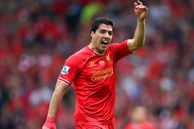 LIVERPOOL, ENGLAND - APRIL 27:  Luis Suarez of Liverpool signals during the Barclays Premier League match between Liverpool and Chelsea at Anfield on April 27, 2014 in Liverpool, England.  (Photo by Clive Brunskill/Getty Images)