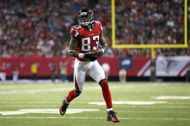 Atlanta Falcons wide receiver Harry Douglas (83) runs the ball after making a catch against the Carolina Panthers during an NFL football game on Sunday, Dec. 28, 2014 in Atlanta. The Panthers won the game 34-3. (Jeff Haynes/AP Images for Panini)