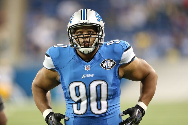 DETROIT, MI - SEPTEMBER 21: Ndamukong Suh #90 of the Detroit Lions warms up prior to the start of the game against the Green Bay Packers at Ford Field on September 21, 2014 in Detroit, Michigan.  (Photo by Leon Halip/Getty Images)