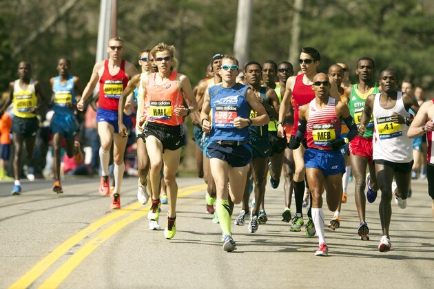 Apr 21, 2014; Boston, MA, USA; Elite runners including Ryan Hall and Meb Keflezighi race during the 2014 Boston Marathon. Mandatory Credit: David Butler II-USA TODAY Sports