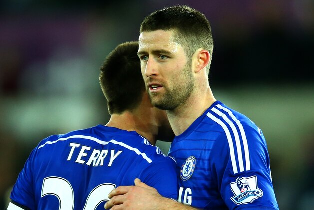 SWANSEA, WALES - JANUARY 17:  Gary Cahill and John Terry of Chelsea speak congratulate each other after the Barclays Premier League match between Swansea City and Chelsea at Liberty Stadium on January 17, 2015 in Swansea, Wales.  (Photo by Richard Heathcote/Getty Images)