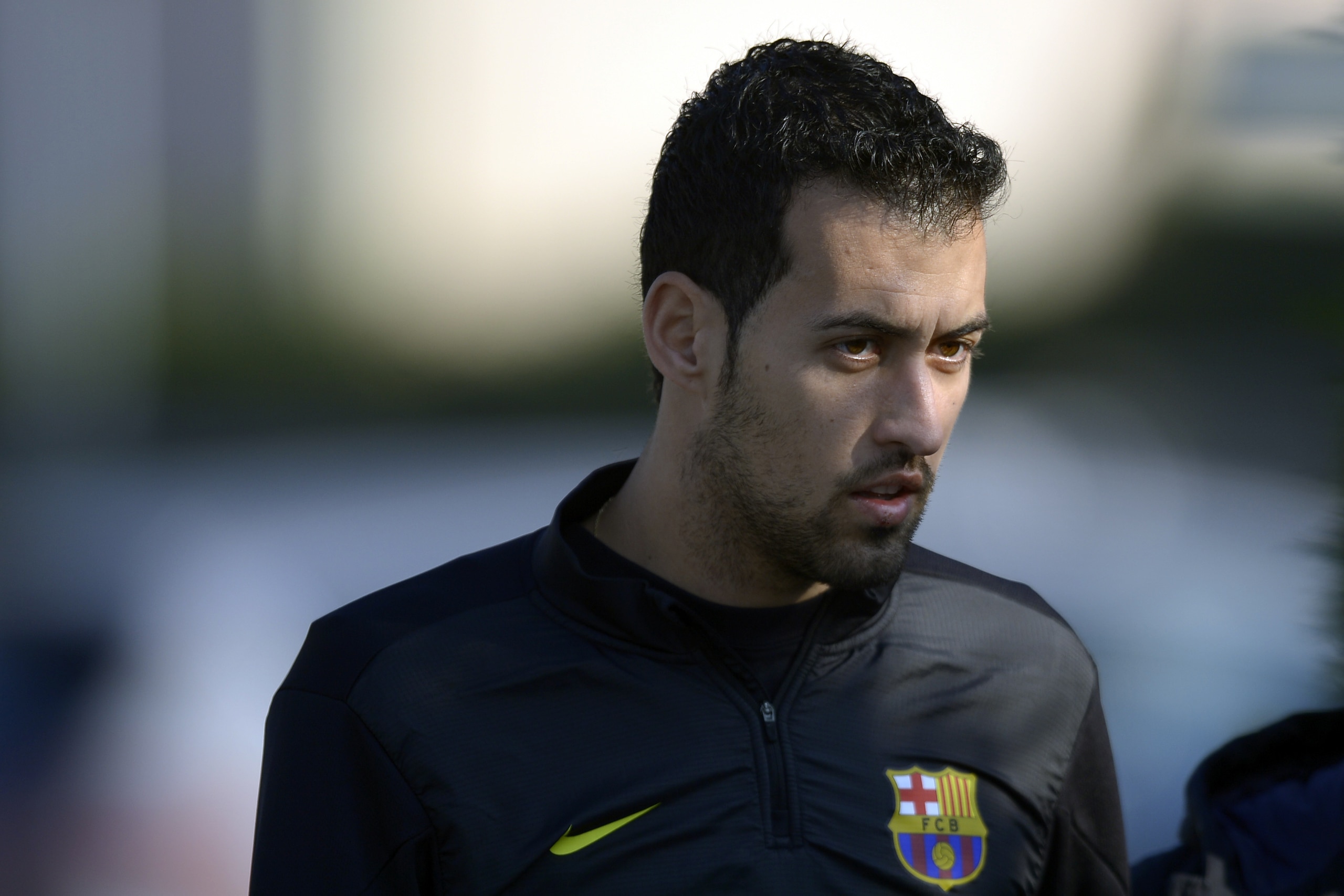 FC Barcelona's Sergio Busquets arrives for a press conference at the Sports Center FC Barcelona Joan Gamper in San Joan Despi, Spain, Tuesday, Dec. 10, 2013. FC Barcelona will play against Celtic in a group H Champions League next Wednesday 11 Dec. (AP Photo/Manu Fernandez)