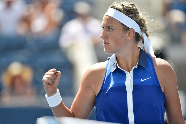 Aug 28, 2014; New York, NY, USA; Victoria Azarenka (BLR) celebrates after beating Christina McHale (USA) on day four of the 2014 U.S. Open tennis tournament at USTA Billie Jean King National Tennis Center. Mandatory Credit: Robert Deutsch-USA TODAY Sports