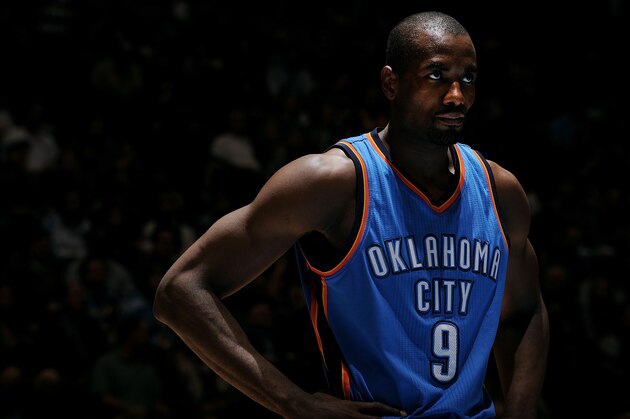 DENVER, CO - FEBRUARY 9: Serge Ibaka #9 of the Oklahoma City Thunder stands on the court during a game against the Denver Nuggets on February 9, 2015 at the Pepsi Center in Denver, Colorado. NOTE TO USER: User expressly acknowledges and agrees that, by downloading and/or using this Photograph, user is consenting to the terms and conditions of the Getty Images License Agreement. Mandatory Copyright Notice: Copyright 2015 NBAE (Photo by Bart Young/NBAE via Getty Images)