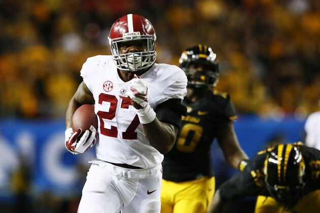 ATLANTA, GA - DECEMBER 06:  Derrick Henry #27 of the Alabama Crimson Tide rushes against the Missouri Tigers in the fourth quarter of the SEC Championship game at the Georgia Dome on December 6, 2014 in Atlanta, Georgia.  (Photo by Kevin C. Cox/Getty Images)