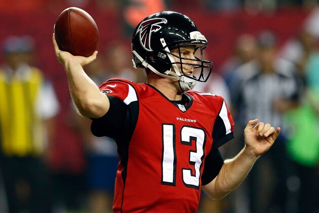 ATLANTA, GA - SEPTEMBER 18: Quarterback T.J. Yates #13 of the Atlanta Falcons passes against the Tampa Bay Buccaneers during a game at the Georgia Dome on September 18, 2014 in Atlanta, Georgia.  (Photo by Kevin C. Cox/Getty Images)