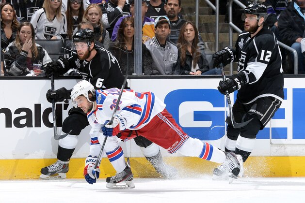 LOS ANGELES, CA - JUNE 13:  Mats Zuccarello #36 of the New York Rangers skates against Jake Muzzin #6 and Marian Gaborik #12 of the Los Angeles Kings during the second period of Game Five of the 2014 NHL Stanley Cup Final at Staples Center on June 13, 2014 in Los Angeles, California. (Photo by Andrew D. Bernstein/NHLI via Getty Images)