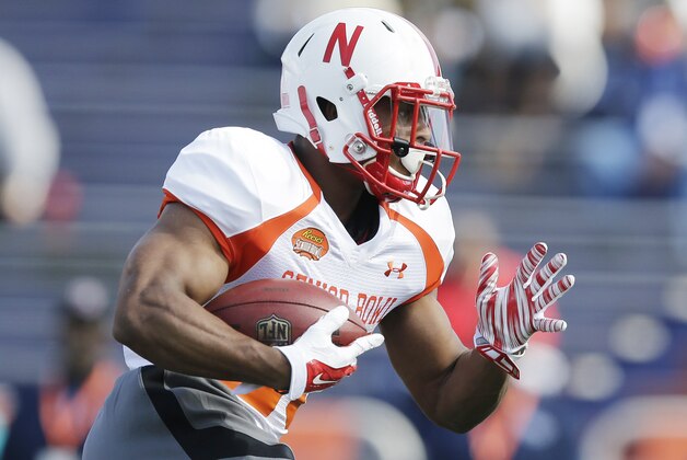 Nebraska running back Ameer Abdullah runs the ball during NCAA college football practice for the Senior Bowl, Tuesday, Jan. 20, 2015, at Ladd-Peebles Stadium in Mobile, Ala. (AP Photo/Brynn Anderson)