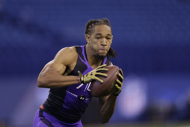 LSU defensive back Jalen Collins runs a drill at the NFL football scouting combine in Indianapolis, Monday, Feb. 23, 2015. (AP Photo/David J. Phillip)