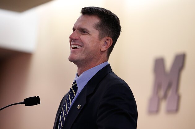 ANN ARBOR, MI - DECEMBER 30:  Jim Harbaugh speaks as he is introduced as the new Head Coach of the University of Michigan football team at the Junge Family Champions Center on December 30, 2014 in Ann Arbor, Michigan.  (Photo by Gregory Shamus/Getty Images)