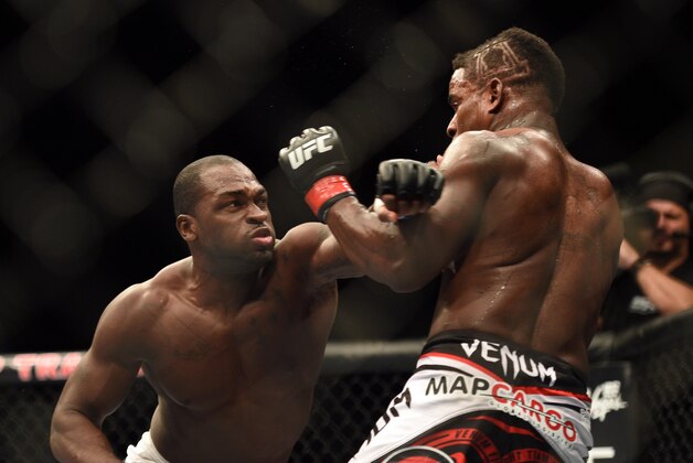 August 30, 2014; Sacramento, CA, USA; Lorenz Larkin (red gloves) fights against Derek Brunson (blue gloves) during the middleweight bout of UFC 177 at Sleep Train Arena. Mandatory Credit: Kyle Terada-USA TODAY Sports
