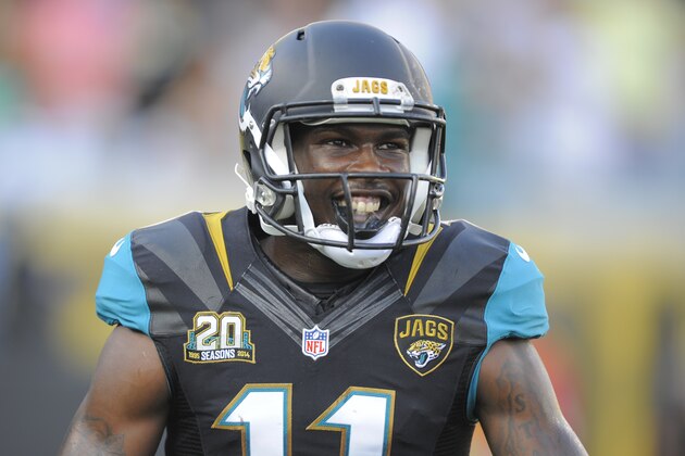 Jacksonville Jaguars wide receiver Marqise Lee is all smiles after scoring a touchdown against the Atlanta Falcons during the first half of an NFL preseason football game in Jacksonville, Fla., Thursday, Aug. 28, 2014. (AP Photo/Stephen B. Morton)