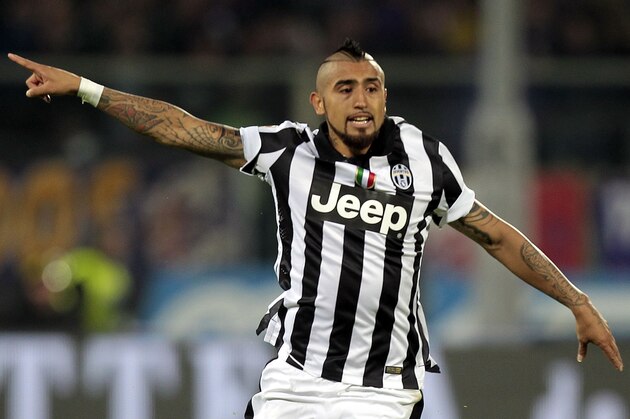 FLORENCE, ITALY - DECEMBER 05: Arturo Vidal of Juventus FC gestures during the Serie A match between ACF Fiorentina and Juventus FC at Stadio Artemio Franchi on December 5, 2014 in Florence, Italy.  (Photo by Gabriele Maltinti/Getty Images)