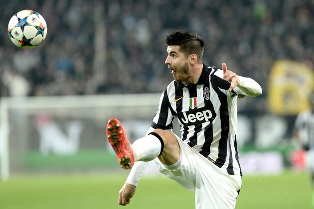 Juventus' Alvaro Morata controls the ball  during the Champions League round of 16 first leg soccer match between Juventus and Borussia Dortmund at the Juventus Stadium, in Turin, Italy, Tuesday, Feb. 24, 2015. (AP Photo/ Massimo Pinca)