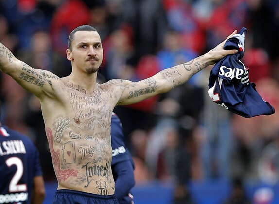 Paris St Germain's Zlatan Ibrahimovic celebrates his goal during the French league one soccer match between PSG and Caen, in Paris, France, Saturday, Feb. 14, 2015. (AP Photo/Christophe Ena)