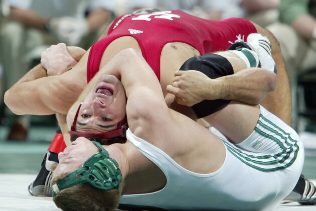 Michigan State's Nick Simmons, bottom, controls Indiana's Andrae Hernandez during the Big Ten wrestling championship in the 133-pound class, Sunday, March 4, 2007, in East Lansing, Mich. Simmons defeated Hernandez 6-4. (AP Photo/Al Goldis)