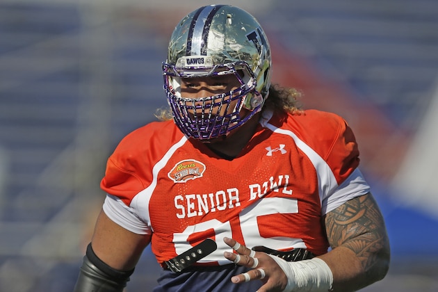 Washington defensive tackle Danny Shelton (95) looks on during NCAA college football practice for the Senior Bowl, Wednesday, Jan. 21, 2015, at Ladd-Peebles Stadium in Mobile, Ala. (AP Photo/Brynn Anderson)