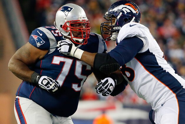 Nov 2, 2014; Foxborough, MA, USA; Denver Broncos tackle Ryan Clady (78) tries to block New England Patriots defensive tackle Vince Wilfork (75) during the fourth quarter of New England's 43-21 win at Gillette Stadium. Mandatory Credit: Winslow Townson-USA TODAY Sports