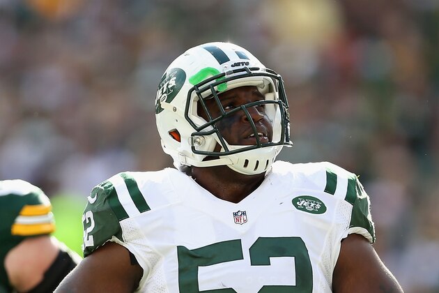 GREEN BAY, WI - SEPTEMBER 14:  Inside linebacker David Harris #52 of the New York Jets during the NFL game against the Green Bay Packers at Lambeau Field on September 14, 2014 in Green Bay, Wisconsin.  The Packers defeated the Jets 31-24.  (Photo by Christian Petersen/Getty Images)