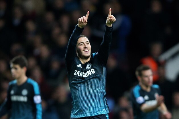 LONDON, ENGLAND - MARCH 04:  Eden Hazard of Chelsea celebrates after scoring the opening goal during the Barclays Premier League match between West Ham and Chelsea at the Boleyn Ground on March 4, 2015 in London, England.  (Photo by Paul Gilham/Getty Images)