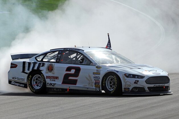 Mar 9, 2014; Las Vegas, NV, USA; NASCAR Sprint Cup driver Brad Keselowski spins out in celebration after winning the Kobalt Tools 400 at Las Vegas Motor Speedway. Mandatory Credit: Stephen R. Sylvanie-USA TODAY Sports
