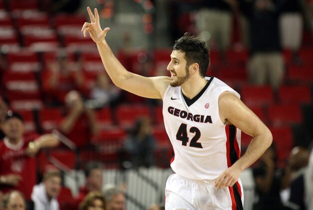 Dec 21, 2013; Athens, GA, USA; Georgia Bulldogs forward Nemanja Djurisic (42) reacts after making a three point shot against the Western Carolina Catamounts in the second half at Stegeman Coliseum. Georgia defeated Western Carolina 65-63. Mandatory Credit: Brett Davis-USA TODAY Sports