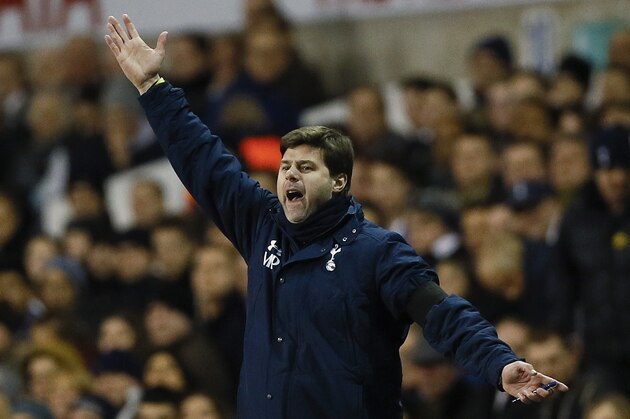 Tottenham's manager Mauricio Pochettino shouts during the English Premier League soccer match between Tottenham Hotspur and Swansea City at White Hart Lane stadium in London, Wednesday, March 4, 2015. (AP Photo/Kirsty Wigglesworth)