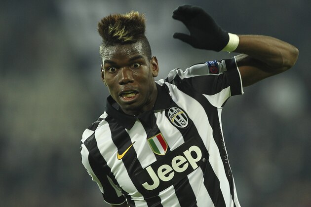 TURIN, ITALY - FEBRUARY 24:  Paul Pogba of Juventus FC in action during the UEFA Champions League Round of 16 match between Juventus and Borussia Dortmund at Juventus Arena on February 24, 2015 in Turin, Italy.  (Photo by Marco Luzzani/Getty Images)