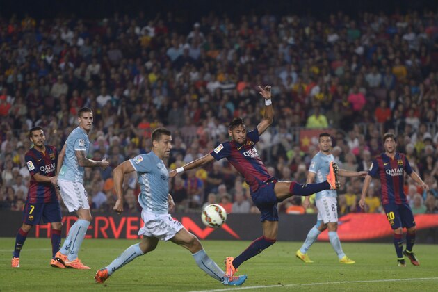 FC Barcelona's Neymar, from Brazil, third right, duels for the ball against Eibar's Borja Ekiza, third left, during a Spanish La Liga soccer match at the Camp Nou stadium in Barcelona, Spain, Saturday, Oct. 18, 2014. (AP Photo/Manu Fernandez) FC Barcelona's Neymar, from Brazil, third right, duels for the ball against Eibar's Borja Ekiza, third left, during a Spanish La Liga soccer match at the Camp Nou stadium in Barcelona, Spain, Saturday, Oct. 18, 2014. (AP Photo/Manu Fernandez)