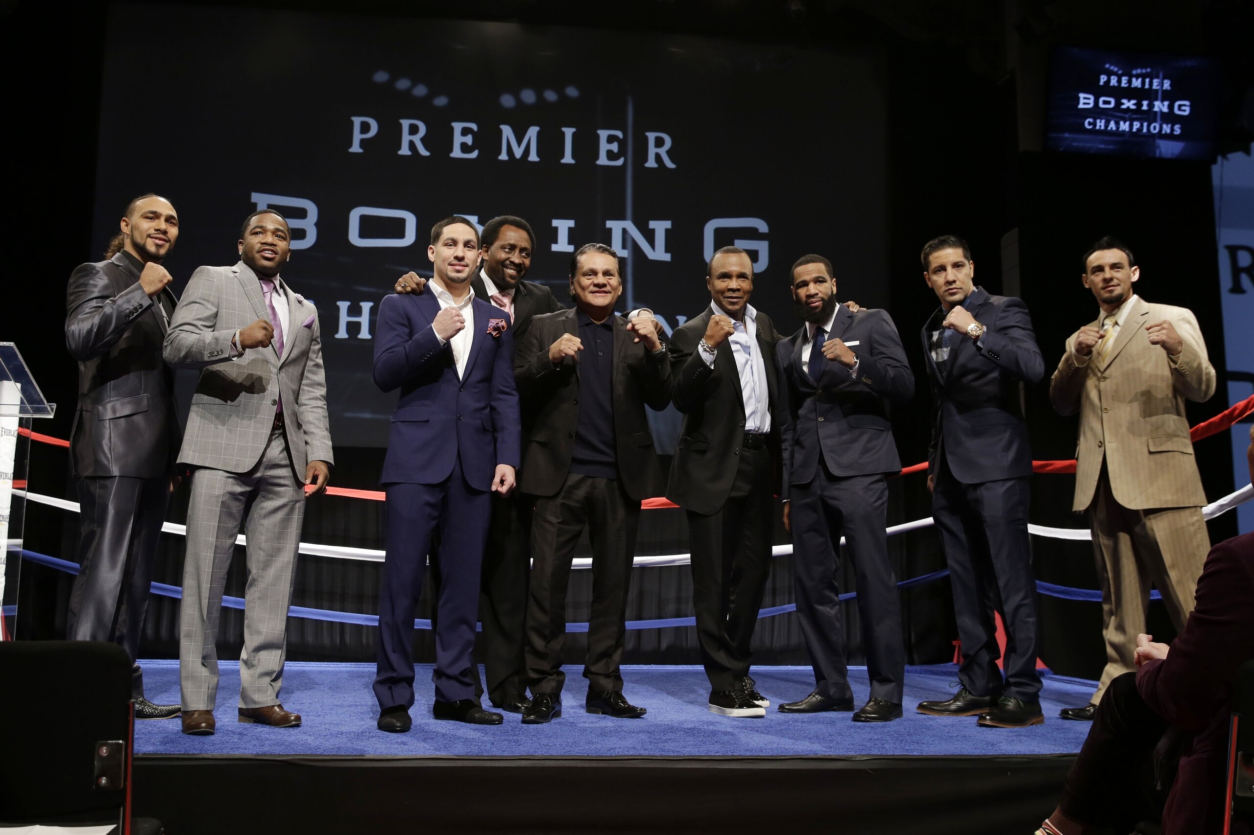 Boxing legends and current fighters pose for a picture during a news conference in New York, Wednesday, Jan. 14, 2015. From left are, Keith Thurman, Adrien Broner, Danny Garcia, Thomas Hearns, Roberto Duran, Sugar Ray Leonard, Lamont Peterson, John Molina, Jr. and Robert Guerrero. NBC plans to air boxing matches on broadcast television beginning with an event on March 7, 2015. (AP Photo/Seth Wenig)