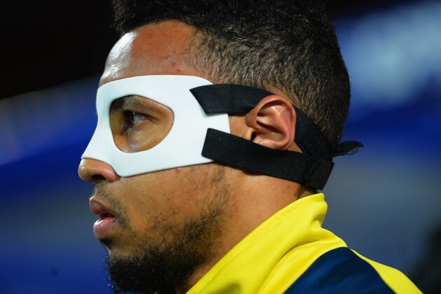 LONDON, ENGLAND - MARCH 04:  Francis Coquelin of Arsenal wears a protective face mask prior to the Barclays Premier League match between Queens Park Rangers and Arsenal at Loftus Road on March 4, 2015 in London, England.  (Photo by Christopher Lee/Getty Images)