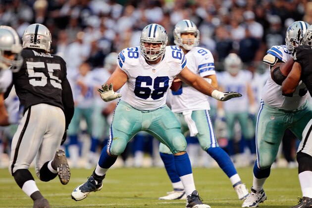 OAKLAND, CA - AUGUST 9:  Tackle Doug Free #68 of the Dallas Cowboys blocks for quarterback Tony Romo against the Oakland Raiders in the second quarter of a preseason game on August 9, 2013 at O.co Coliseum in Oakland, California.  The Raiders won 19-17.  (Photo by Brian Bahr/Getty Images)