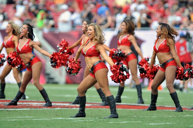 TAMPA, FL - SEPTEMBER 15: Cheerleaders of the Tampa Bay Buccaneers dance at midfield before play against the New Orleans Saints September 15, 2013 at Raymond James Stadium in Tampa, Florida. (Photo by Al Messerschmidt/Getty Images)