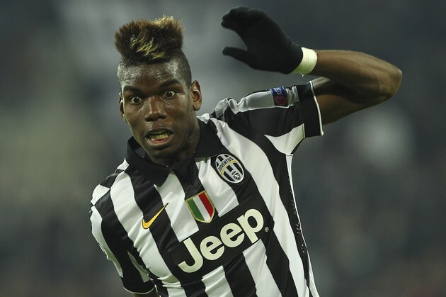 TURIN, ITALY - FEBRUARY 24:  Paul Pogba of Juventus FC in action during the UEFA Champions League Round of 16 match between Juventus and Borussia Dortmund at Juventus Arena on February 24, 2015 in Turin, Italy.  (Photo by Marco Luzzani/Getty Images)