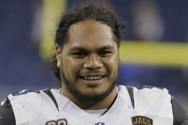 Jacksonville Jaguars defensive end Tyson Alualu (93) walks off the field after a preseason NFL football game against the Detroit Lions at Ford Field in Detroit, Friday, Aug. 22, 2014.  (AP Photo/Duane Burleson)