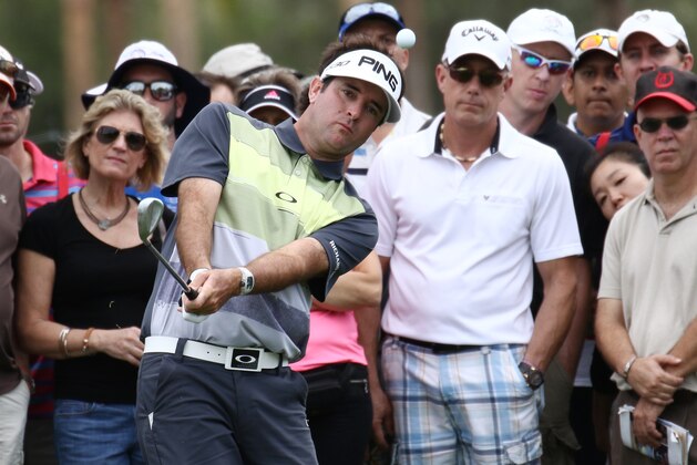 Bubba Watson hits chips the rough to the seventh green during the third round of the Cadillac Championship golf tournament Saturday, March 7, 2015, in Doral, Fla. (AP Photo/J Pat Carter)