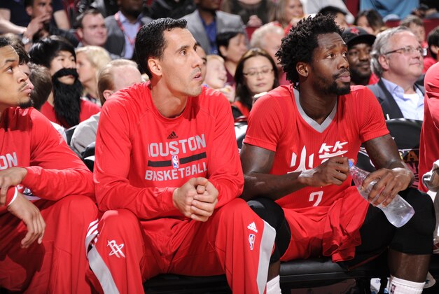 HOUSTON, TX - FEBRUARY 21: Pablo Prigioni #9 and Patrick Beverley #2 of the Houston Rockets sit on the sideline during a game against the Toronto Raptors on February 21, 2015 at the Toyota Center in Houston, Texas. NOTE TO USER: User expressly acknowledges and agrees that, by downloading and or using this photograph, User is consenting to the terms and conditions of the Getty Images License Agreement. Mandatory Copyright Notice: Copyright 2015 NBAE (Photo by Bill Baptist/NBAE via Getty Images) HOUSTON, TX - FEBRUARY 21: Pablo Prigioni #9 and Patrick Beverley #2 of the Houston Rockets sit on the sideline during a game against the Toronto Raptors on February 21, 2015 at the Toyota Center in Houston, Texas. NOTE TO USER: User expressly acknowledges and agrees that, by downloading and or using this photograph, User is consenting to the terms and conditions of the Getty Images License Agreement. Mandatory Copyright Notice: Copyright 2015 NBAE (Photo by Bill Baptist/NBAE via Getty Images)