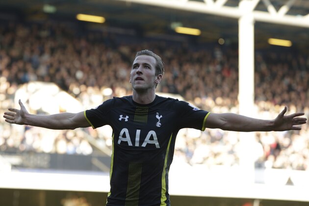 Tottenham’s Harry Kane celebrates after scoring his second goal of the game during the English Premier League soccer match between Queens Park Rangers and Tottenham Hotspur at the Loftus Road stadium London, Saturday, March, 7, 2015. (AP Photo/Alastair Grant)