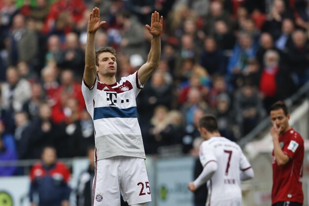 Bayern's Thomas Mueller celebrates after he scored his side's 2nd goal during the German first division Bundesliga soccer match between Hannover 96 and Bayern Munich in Hannover, Germany, Saturday, March 7, 2015. (AP Photo/Markus Schreiber)