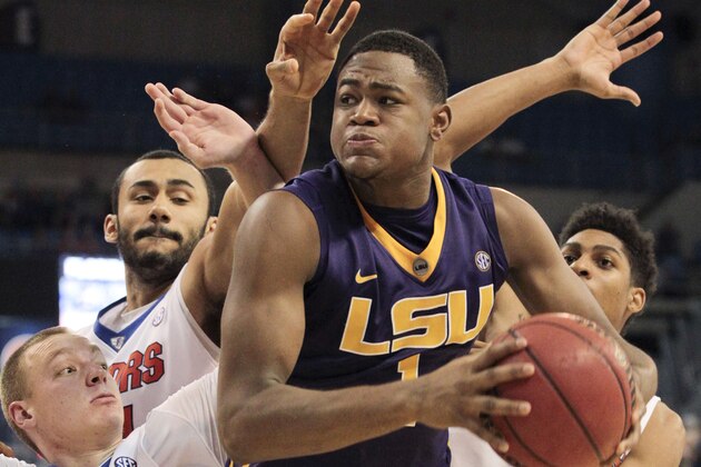 Jan 20, 2015; Gainesville, FL, USA; LSU Tigers forward Jarell Martin (1) tries to shoot while being guarded by Florida Gators forward Jacob Kurtz (30) and forward Jon Horford and forward Devin Robinson (right) during the second half of an NCAA college basketball game at the Stephen C. O'Connell Center.LSU won 79-61. Mandatory Credit: Reinhold Matay-USA TODAY Sports