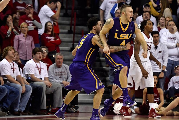 Mar 7, 2015; Fayetteville, AR, USA; LSU Tigers guard Keith Hornsby (4) reacts after making a three point shot at the buzzer to defeat the Arkansas Razorbacks at Bud Walton Arena. LSU won 81-78. Mandatory Credit: Jasen Vinlove-USA TODAY Sports
